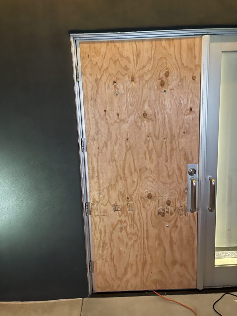 boarded up door